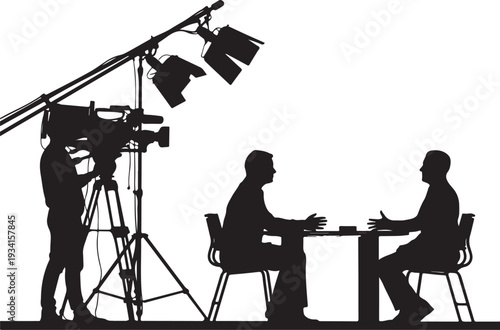 Silhouette of crew recording interview with two men