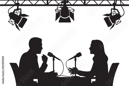 Silhouette of man and woman talking at microphones under stage lights