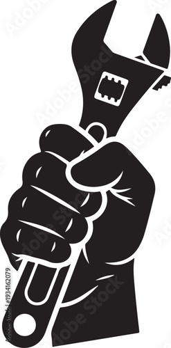 A hand firmly gripping a wrench ready for mechanical work or repair.