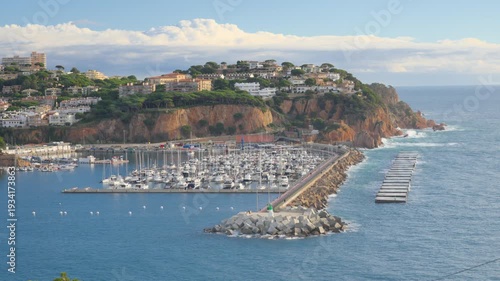 Idyllic coastal town marina in sant feliu de guixols