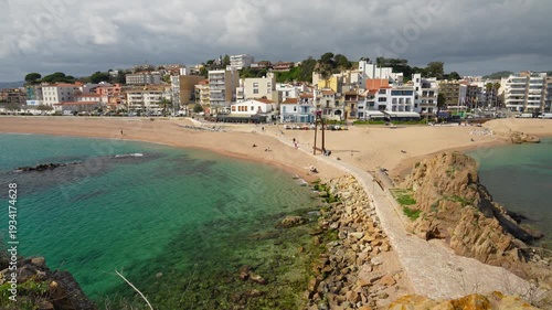 Blanes beach in costa brava with sa palomera rock and turquoise water