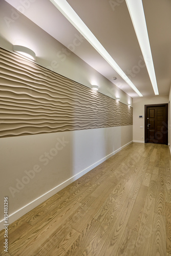 Modern corridor with textured wavy wall panels