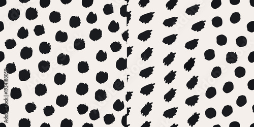 Abstract black spots on a cream colored background creating a playful pattern