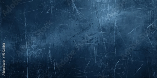 A dark blue grunge wall texture with a vintage black chalkboard pattern creates a rough dirty backdrop and blank paper surface design.