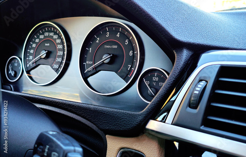 Billede på lærred Close up of a car engine temperature gauge on the dashboard showing high temperature warning