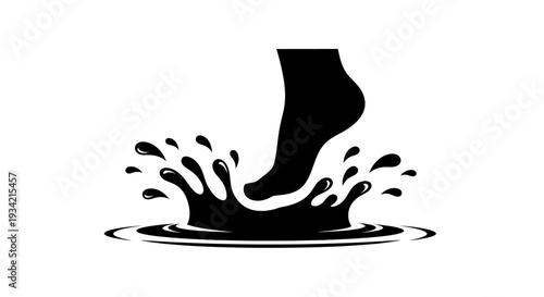 Silhouette of a Foot Stepping into Water Creating Splashes.