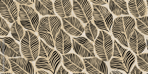 Abstract pattern of black leaves on a beige background texture