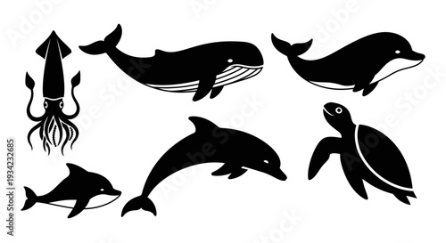 Ocean animal silhouettes set: whale, dolphin, squid, and sea turtle vector icons