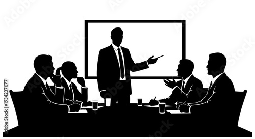 Businessman presenting to colleagues in meeting room.