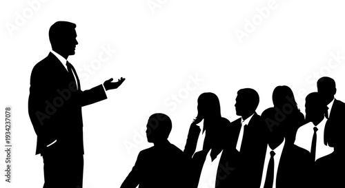 Businessman presenting to group of professionals.