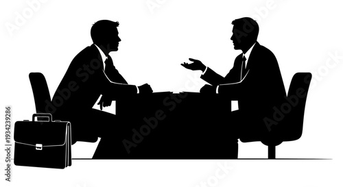 Two Businessmen Discussing at Office Table.