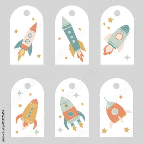 Set of small tags for babies with cute rockets