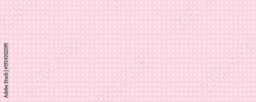 Polka dot seamless pattern. White dots on pink background.