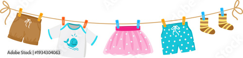 Baby clothes drying on clothesline for new arrival