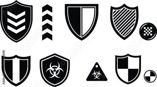 Minimalist flat shield icon set with varied emblems including chevrons biohazard divided panels and checker badges arranged on white background for security design vector art icons