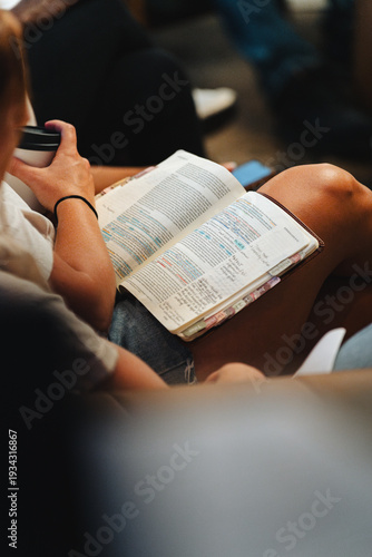 Φωτογραφία Woman reading bible with highlighted text and coffee cup
