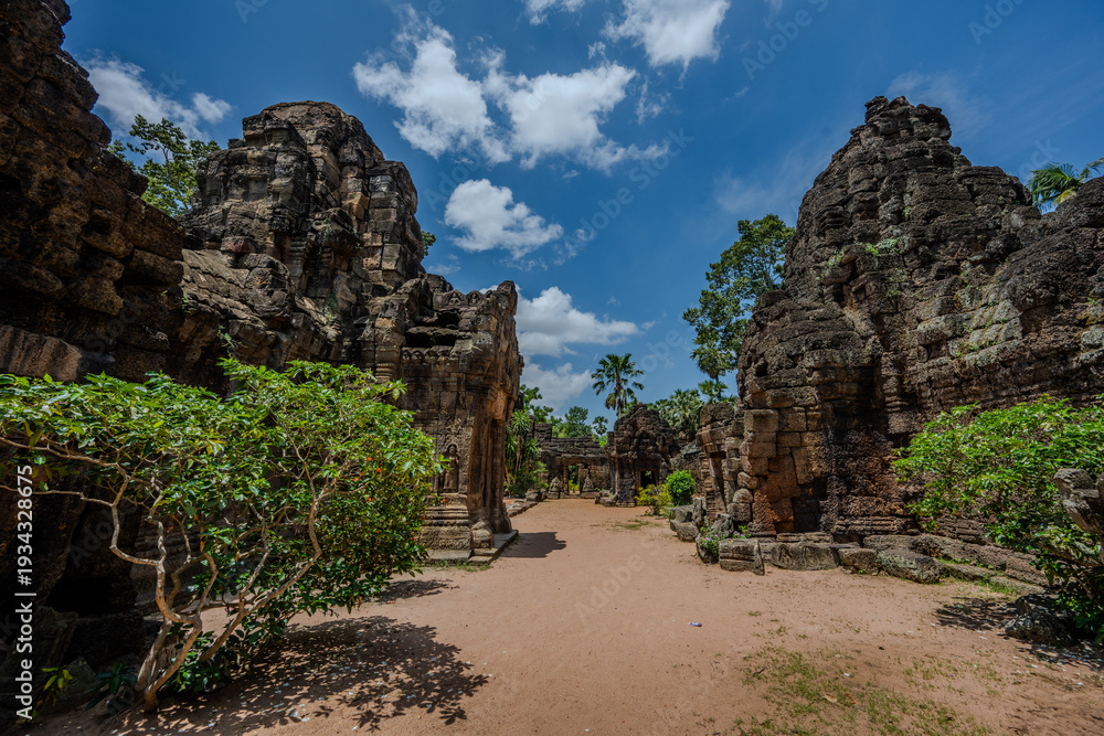 Naklejka premium Ancient stone ruins and trees at Prasat Prei temple in Cambodia