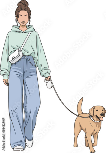 A woman walking her dog in a casual outfit