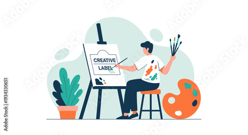 Artist painting a creative label on canvas, art and design concept
