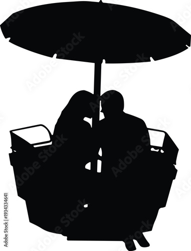 Romantic couple enjoying a quiet evening under a cozy umbrella