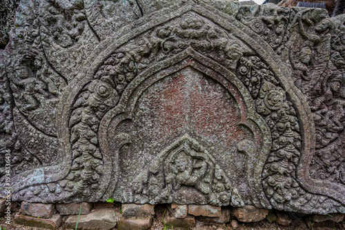 Photos Ancient stone lintel with intricate Khmer carvings at Phnom Chisor temple