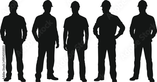 Construction worker silhouettes in front view wearing hard hats and uniforms, standing confident poses, isolated black vector illustration set