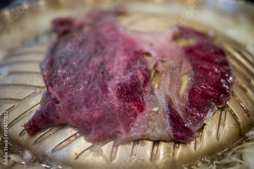 Wallpaper Mural Raw beef on a brass pan. Close up Torontodigital.ca