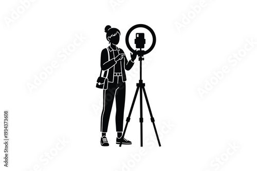 Black and white female vlogger with ring light silhouette - Monochrome content creator filming with smartphone tripod art