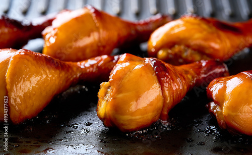 Wallpaper Mural chicken drumsticks grilling on a barbecue grill close up. Torontodigital.ca