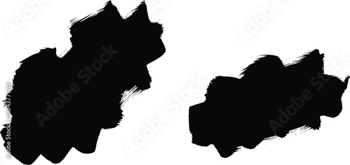 Two black ink blots on white background