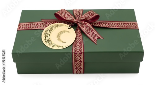 Elegant green gift box with red ribbon and gold crescent moon tag