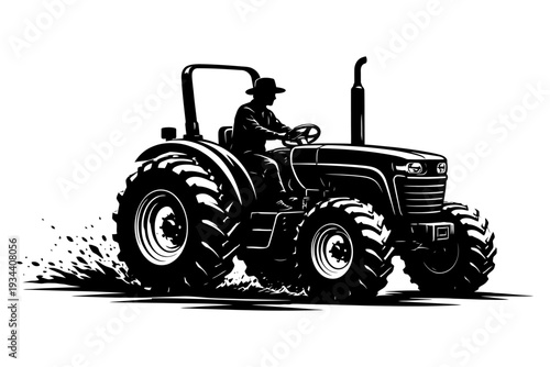 Silhouette of farmer on tractor plowing field.