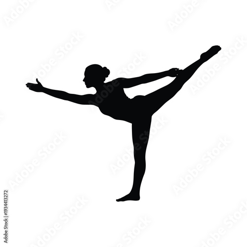 Silhouette of dancer in dynamic yoga pose with one leg extended