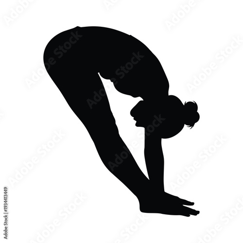 Woman in downward facing dog yoga pose silhouette