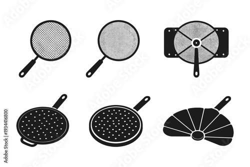 Collection of kitchen strainers and sieves for cooking and baking preparation