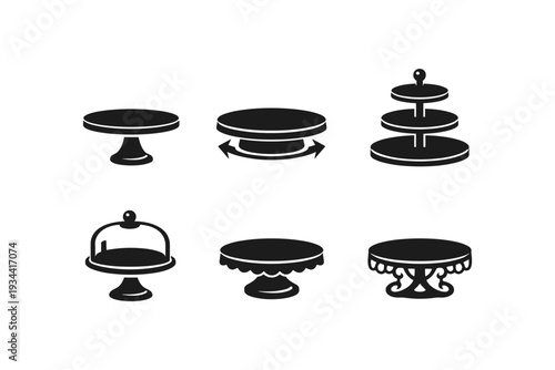 Collection of black silhouette icons representing various cake stands and serving platters