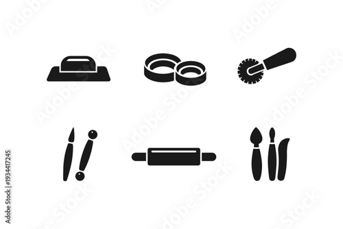 Collection of baking and sculpting tools, including a rolling pin and cutters