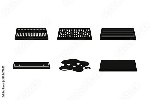 Collection of different grill grates and a puddle of liquid, isolated on white background