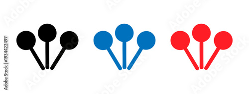 Three sets of paint brushes with black, blue, and red bristles