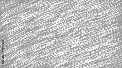 Abstract pattern of diagonal white scratches on a gray textured background