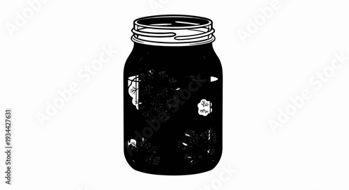 Black jar filled with dark liquid, adorned with delicate plant sprigs