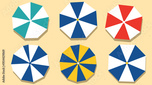 Colorful beach umbrellas arranged in rows seen from a top down perspective on golden sand for summer vacation concept.