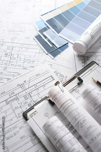 Canvastavla Architecture blueprints with rolled plans, compass and clipboard on desk, construction documentation and engineering design workflow,planning and project management concept, copy space