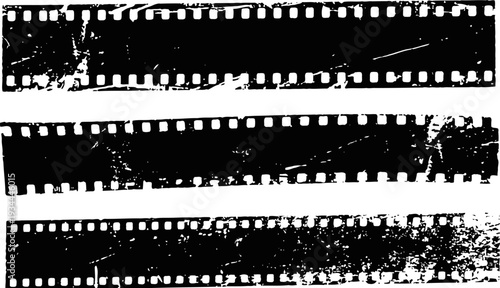 Grunge film strips set with scratches, distressed textures and worn edges for retro design elements