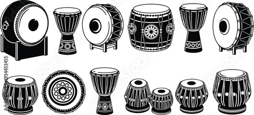 Collection of traditional Indian drums and percussion instruments in detailed black and white vector illustration set isolated