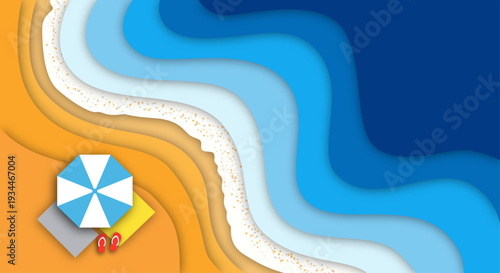 Top view of beach scene with umbrella, towels, and flipflops on sand next to wavy blue ocean layers in paper cut style illustration