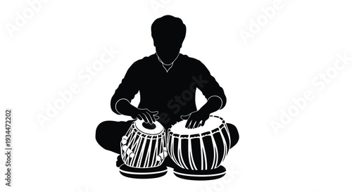 Musician playing traditional drums in a striking black silhouette high quality