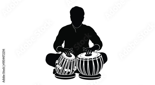 Indian musician playing tabla drums a striking black form silhouette