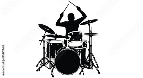 Drummer playing a full kit with raised sticks stark black silhouette
