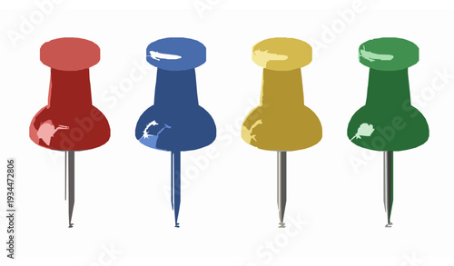 A colorful set of push pins in red, blue, yellow, and green